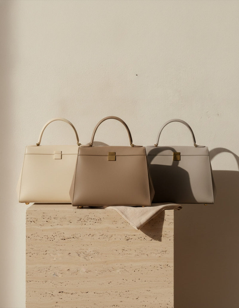 Structured pre-owned leather handbags on display at House of Brandz