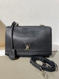Louis Vuitton Lv Lockme — pre-owned, Well used