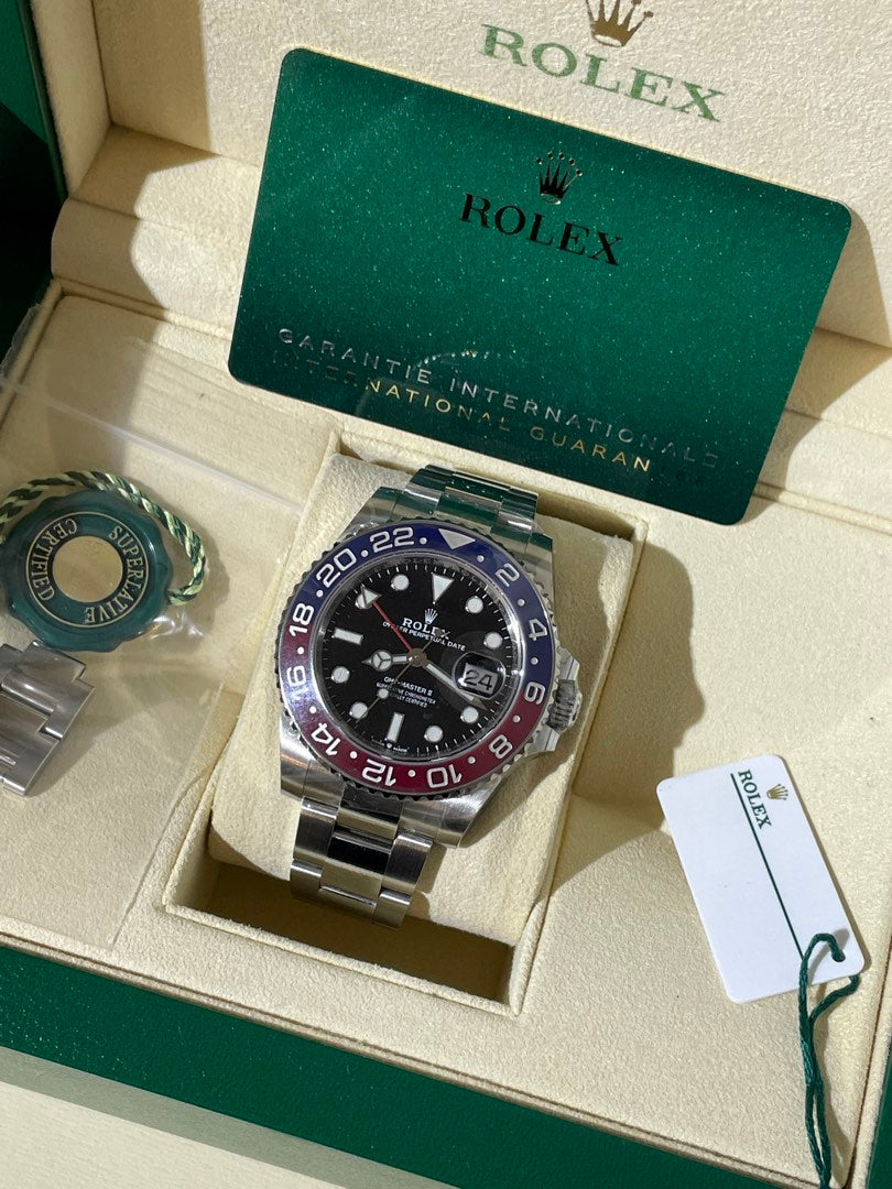 Rolex Rolex GMT II 116710BLRO — pre-owned, Well used